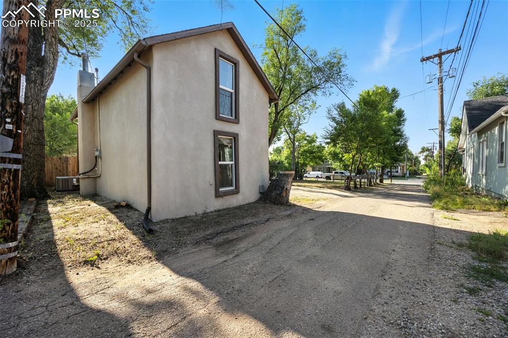 View of property exterior featuring stucco siding