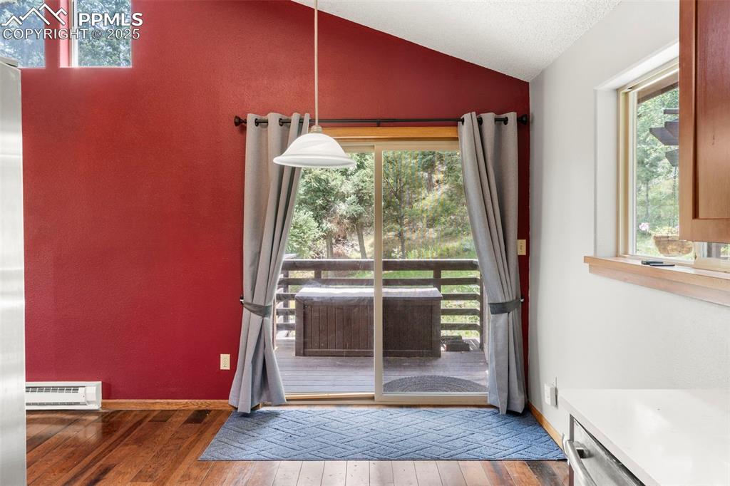 Dining Area with a Vinyl, Sliding Glass Door