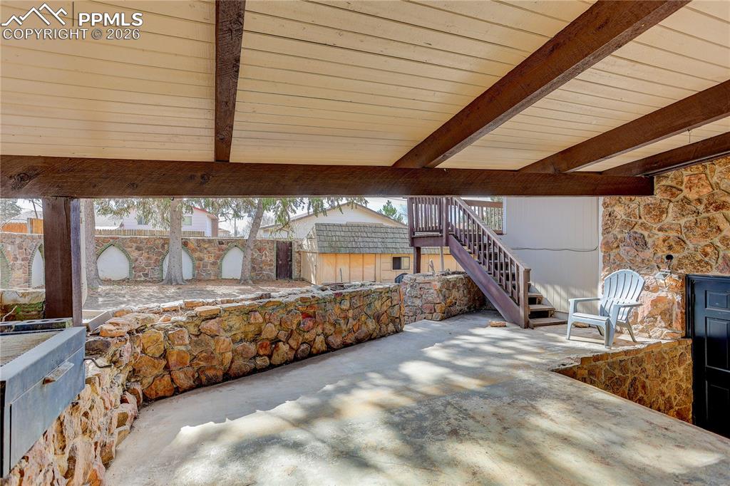 Covered patio space designed for outdoor gatherings.