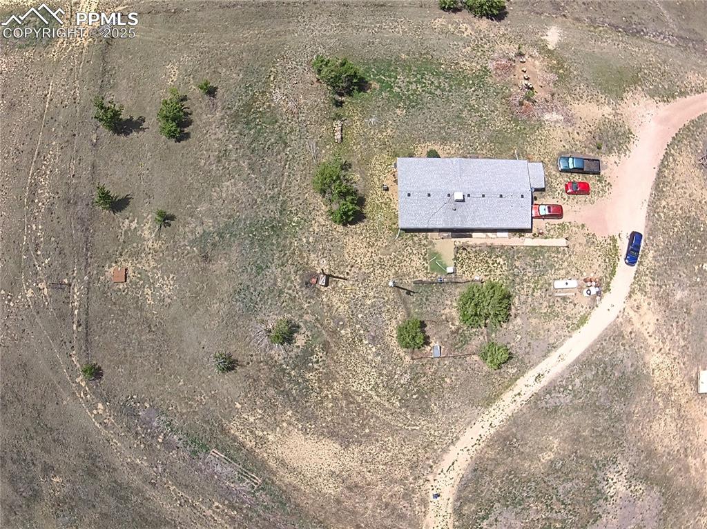 Aerial view showcasing this Colorado property and surrounding rural landscape