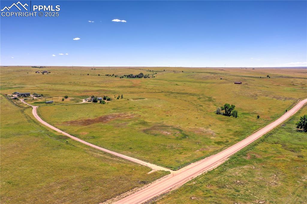 Expansive aerial overview capturing the home’s location and peaceful rural landscape