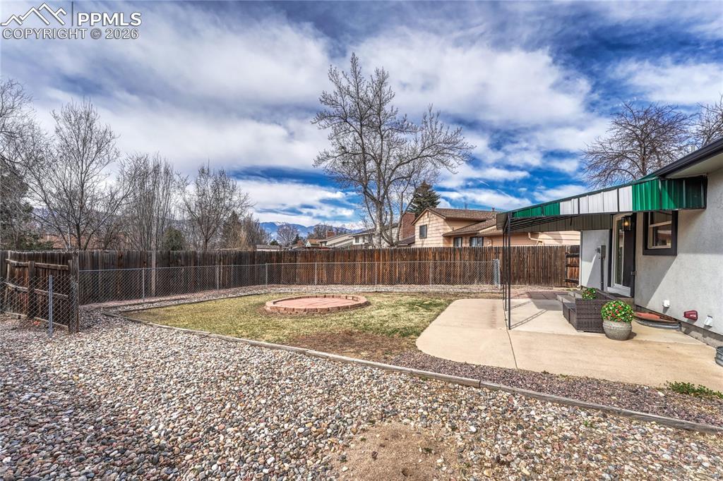Large yard with mountain views