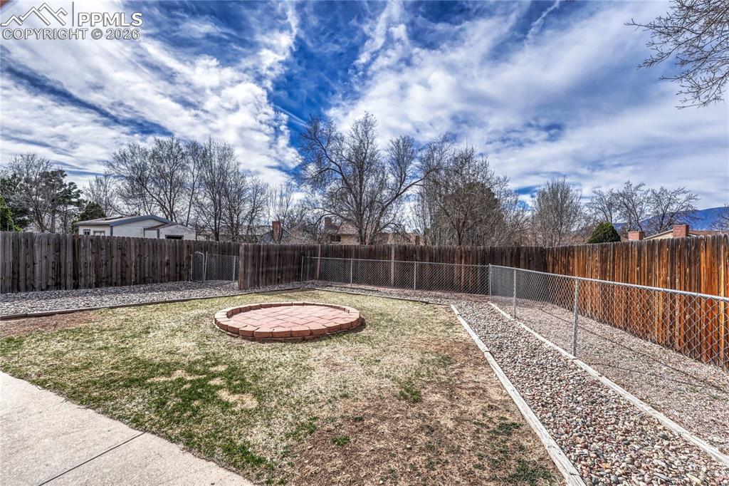 Fully fenced yard with dog run