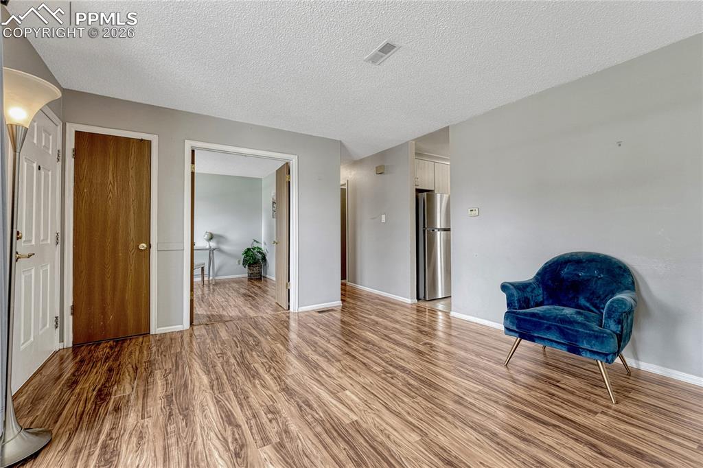 Looking into the office with double doors from the living room