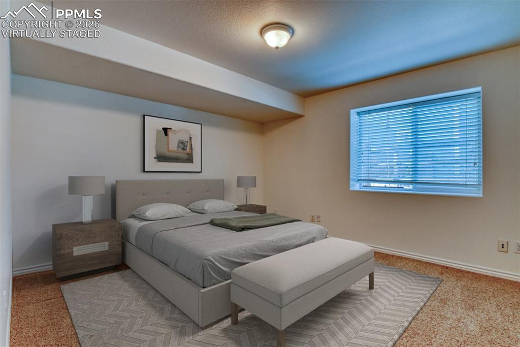 Virtually Staged beroom in the basement