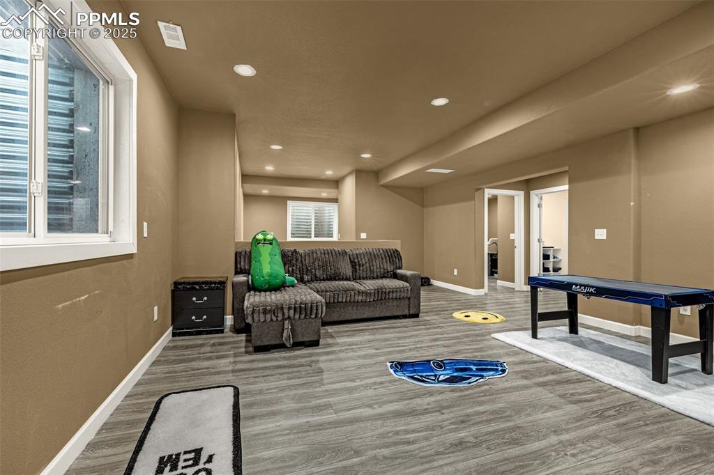 Game room featuring recessed lighting and wood finished floors