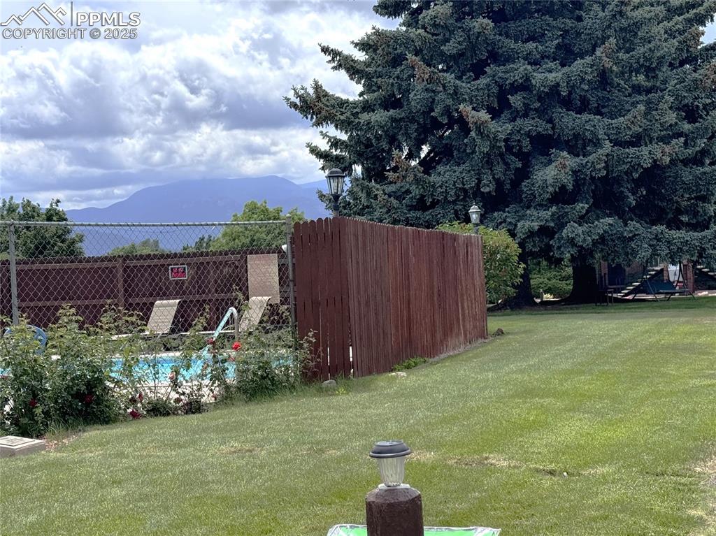 View of yard with a mountain view