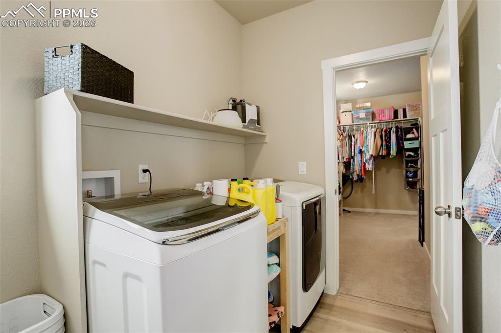 Upper level laundry - adjoins the primary bedrooms walk-in closet that is adjoining to the primary ensuite. and the bonus area on the upper level at the top of the the stairs.