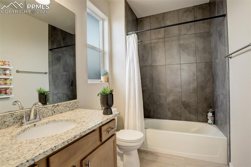 Another Upstairs/West facing large Bedroom featuring a walk-in close and adjoining bathroom