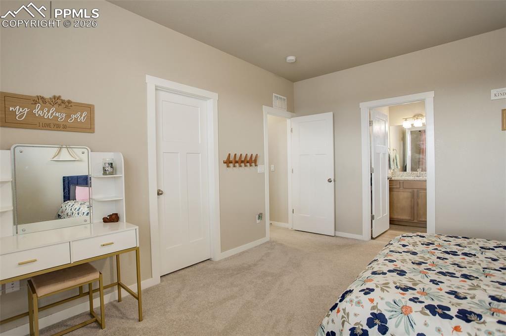 Upper level; Bathroom Full bathroom featuring stone vanity, shower/tub with tub to ceiling tile. Lots of natural light!