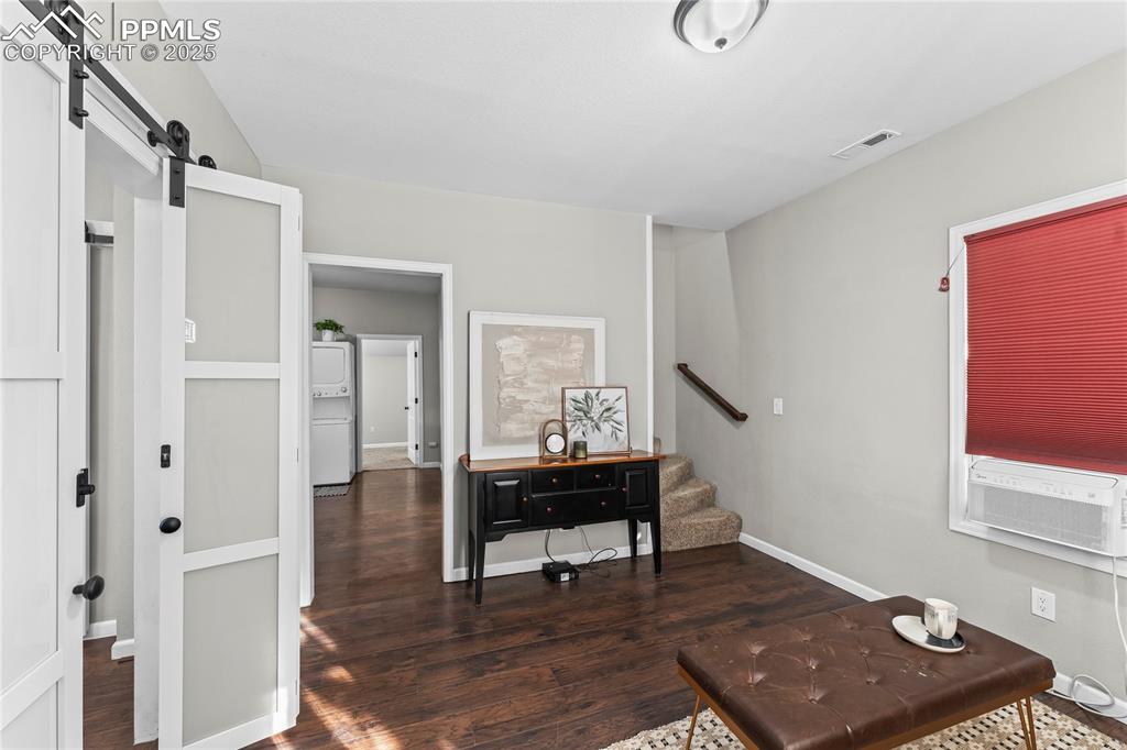 Living room with access to  kitchen, dining room and stairs