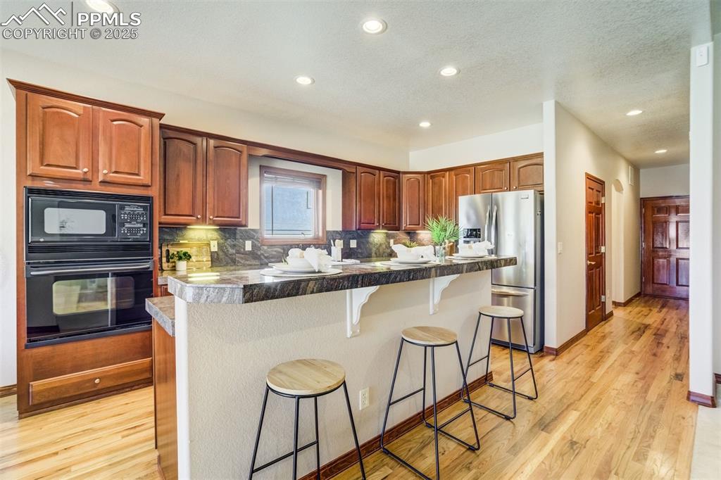 Kitchen island for additional seating. 