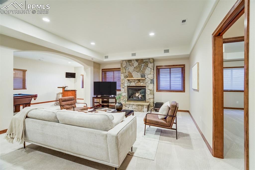 A pocket door separates the family room from the bedroom areas. 