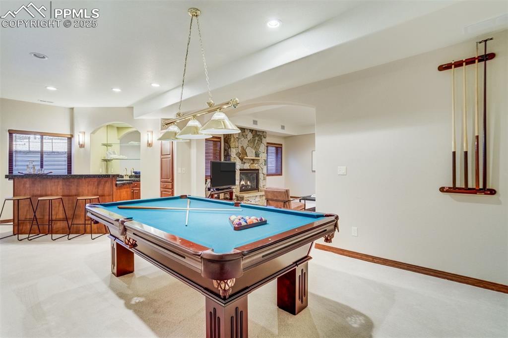 Pool table/ rec area must off the family room. 