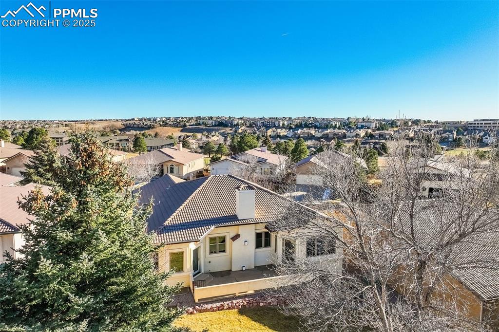 Rear view of the home & private patio.