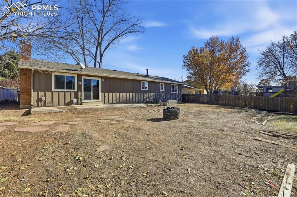 Rear view of property large back yard