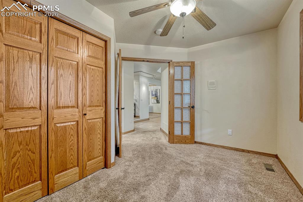 Wood closet in the main level Bedroom/Office.