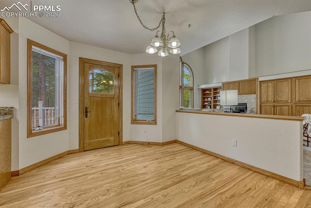 Dining Nook with access to the backyard deck for outdoor dining and relaxation.