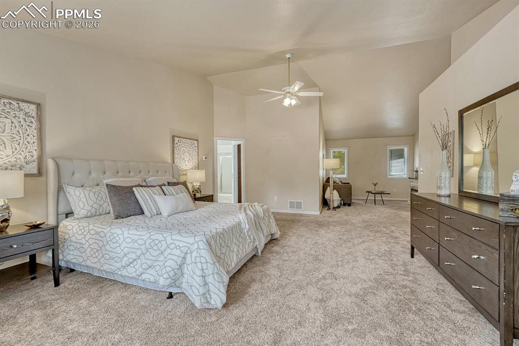 The Upper Level Primary Bedroom is a private retreat with it's own private Sitting Room.