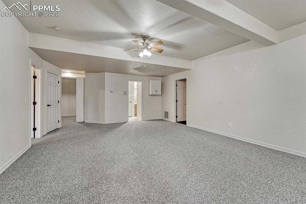 The large Basement Rec Room has carpet and a lighted ceiling fan and is perfect for a Game Room, Media Room, or 2nd Family Room to gather and have fun.