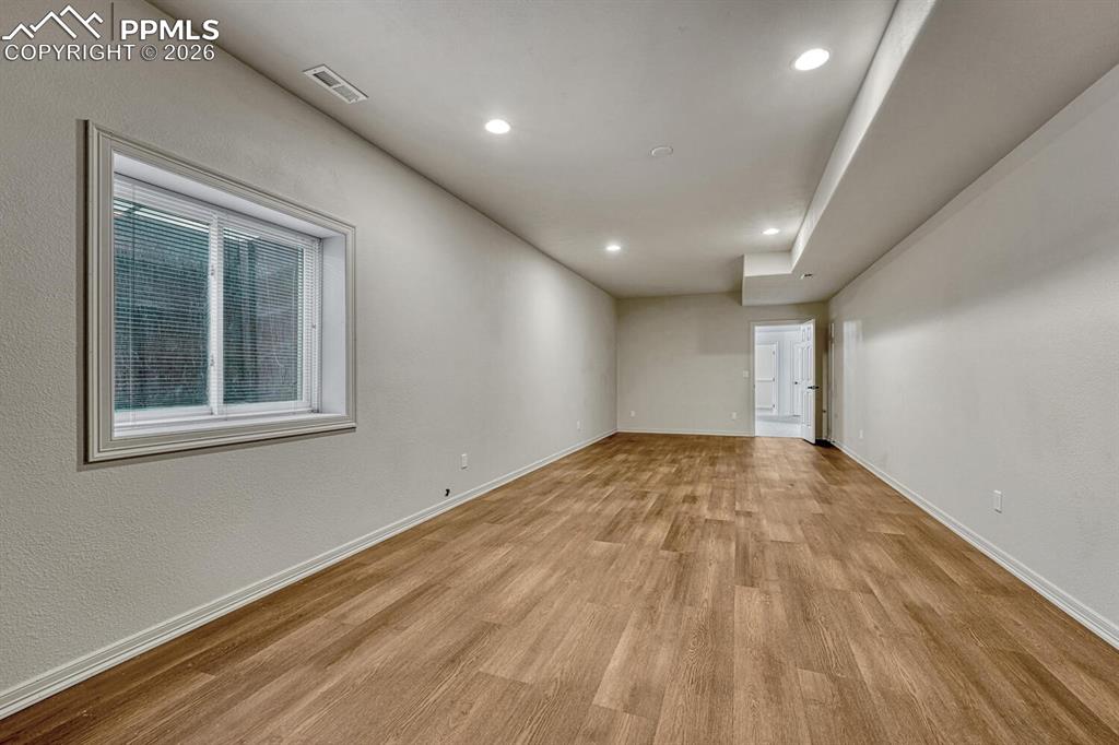 The Flex Room has LVP flooring and can be used for many purposes including a Home Gym, Craft Room, or Play Room.