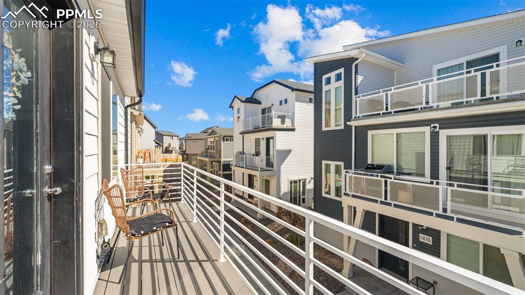 Balcony featuring a residential view