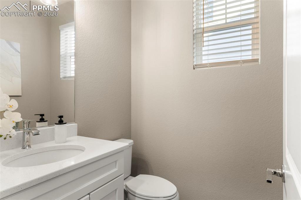 Half bath, near office and living room on main floor