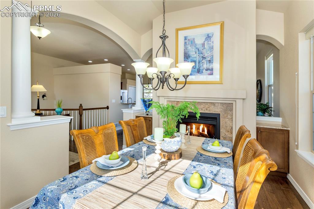 The cozy double-sided gas fireplace creates a warm and inviting spot to linger with friends.