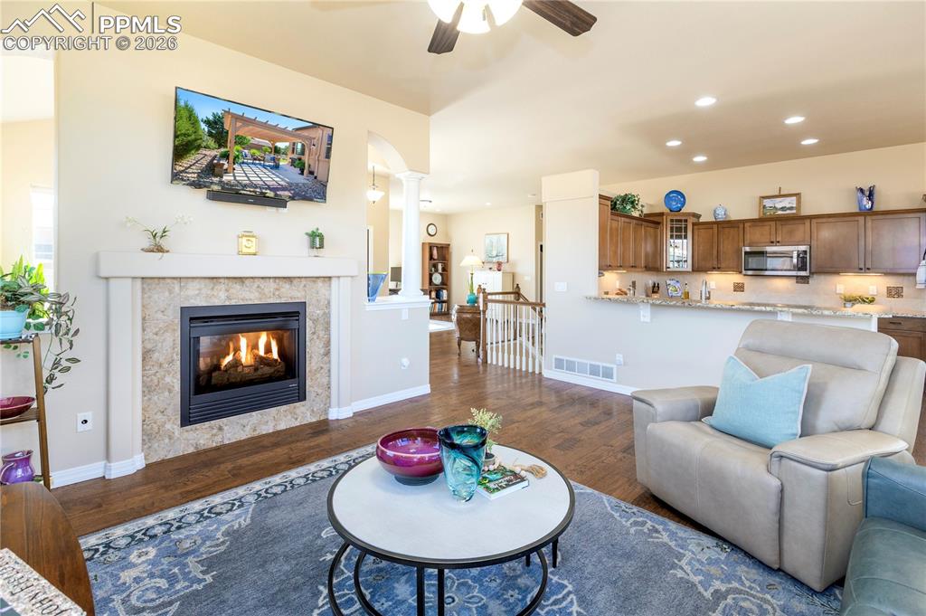 And on the opposite side, it creates a dramatic focal point that enhances the open-concept design.