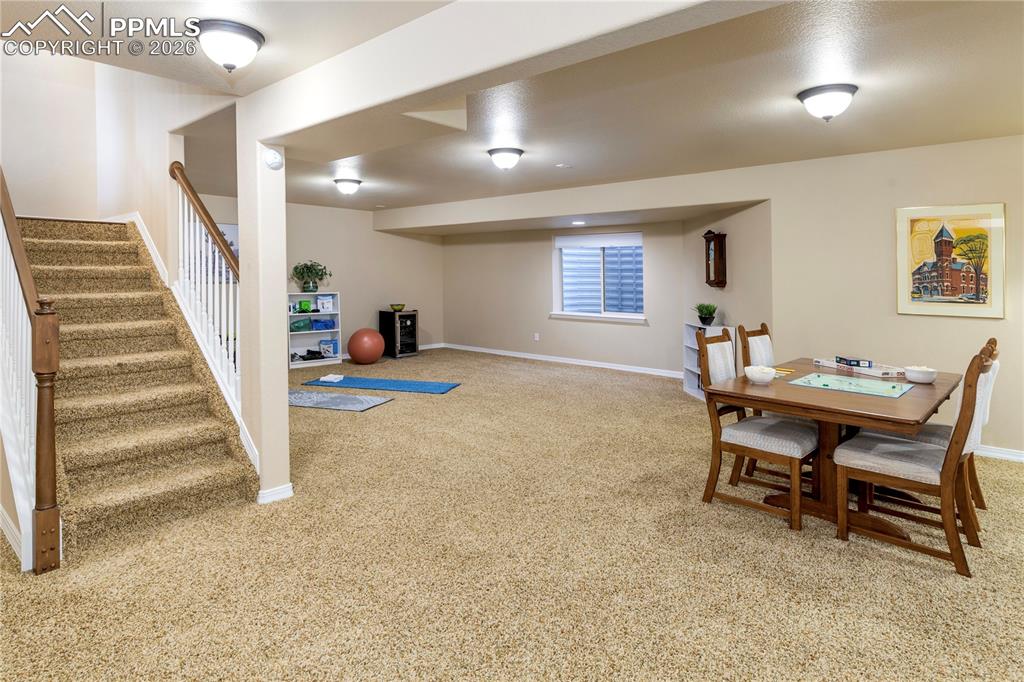 Spacious downstairs family room can easily accommodate a large sectional for movie night, a workout area and a game room.