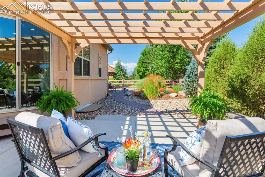 Lovely park-like setting in the summer with Pikes Peak in the distance.