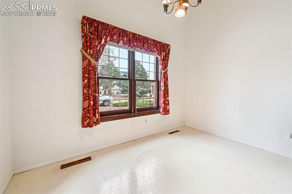 More high ceilings in this eat-in kitchen area.