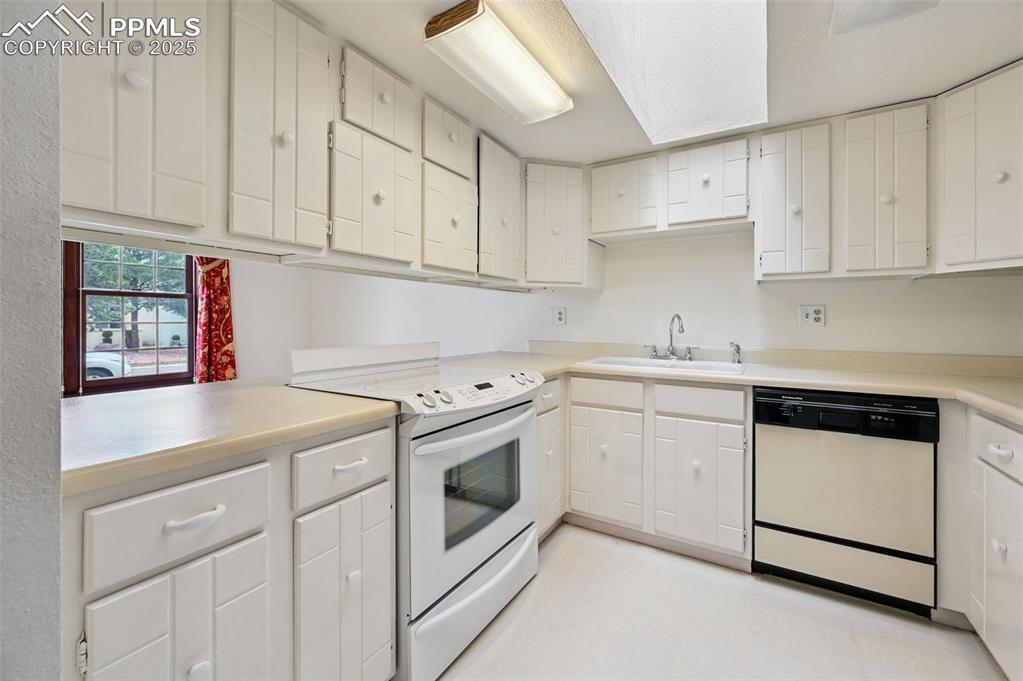 The countertops and smooth-top stove provide ample meal preparation space. 
