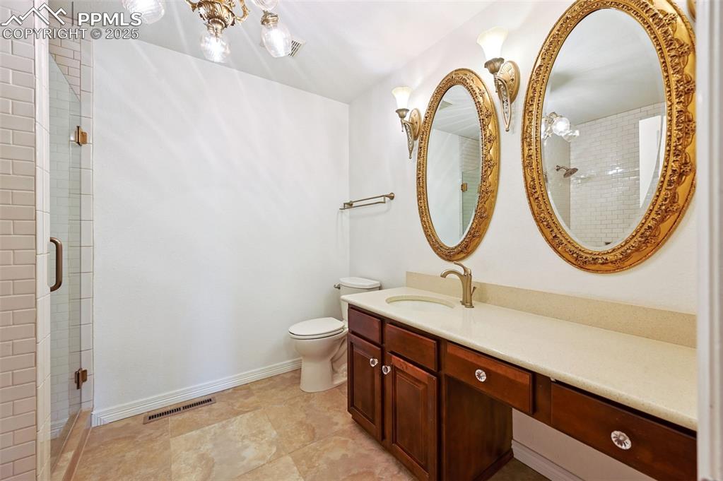 The master bedroom includes a private wing complete with master bathroom and 3 closets. This bathroom has beautiful antique finishes and warm-floor heating!