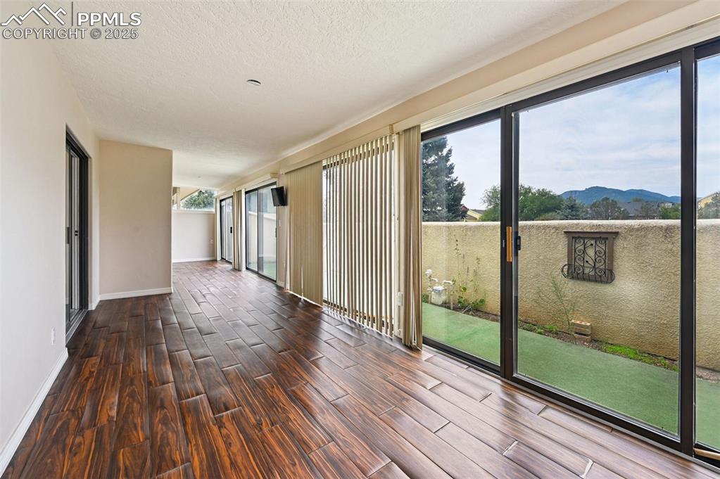 This sunroom is special, running the length of the home!