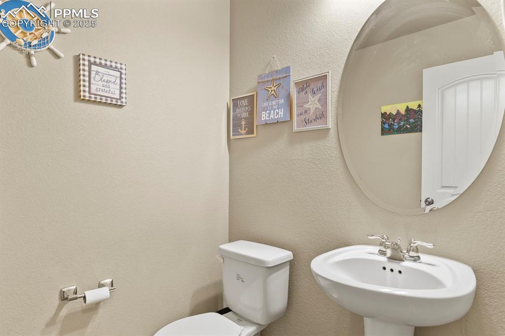Bathroom featuring a sink and toilet