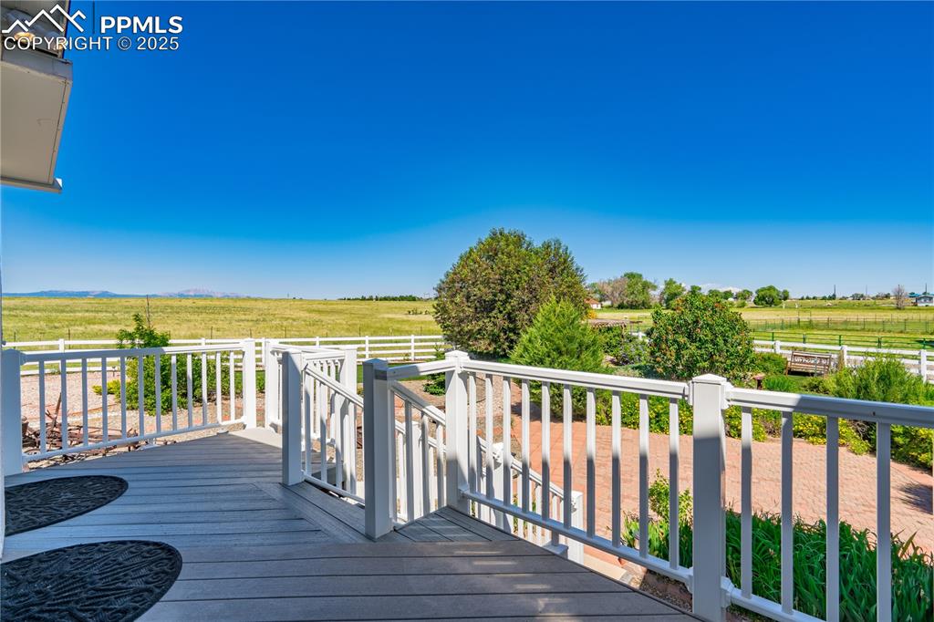 Deck featuring a rural view