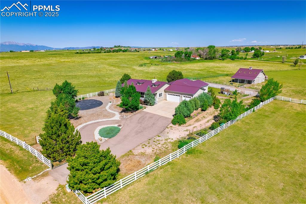 Aerial view of sparsely populated area with agricultural land