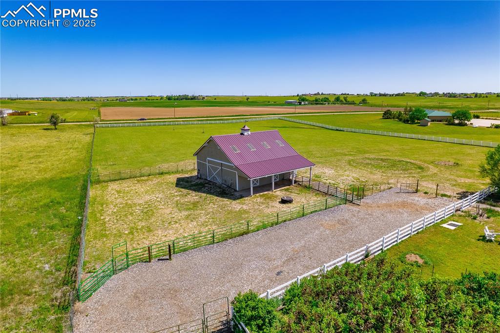 Aerial view of sparsely populated area with agricultural land
