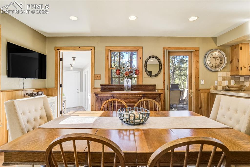 Dining room, with lovely wainscoting, walkout to back deck