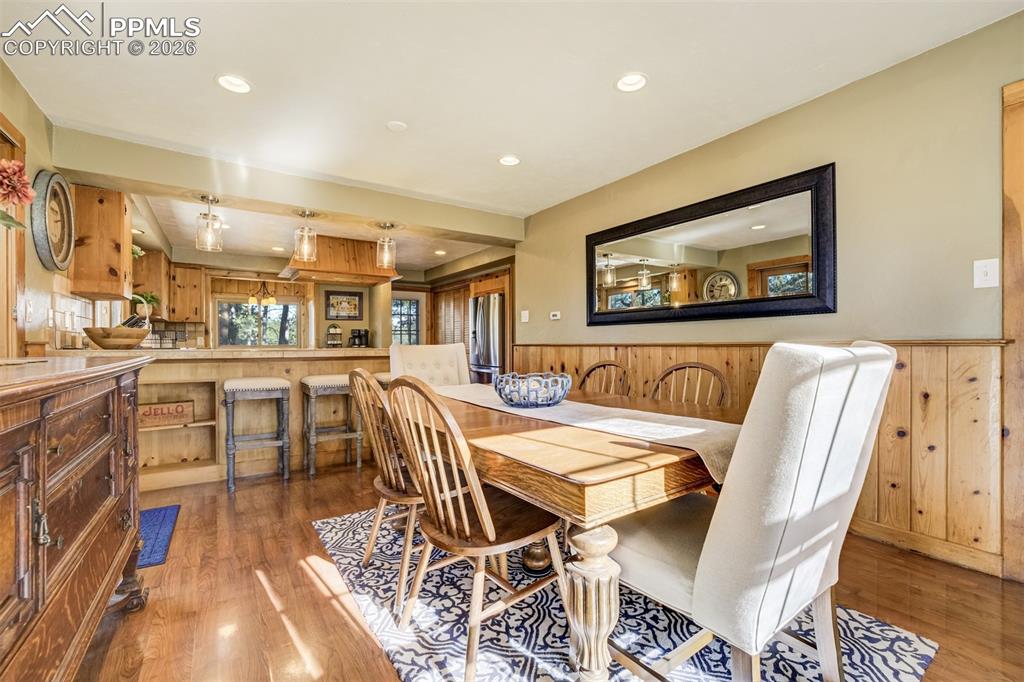 Dining room, with lovely wainscoting, walkout to back deck