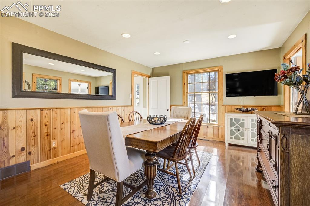 Dining room, with lovely wainscoting, walkout to back deck