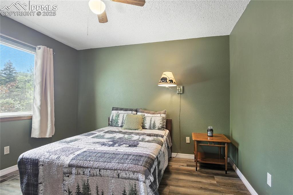 Bedroom with walk-in closet