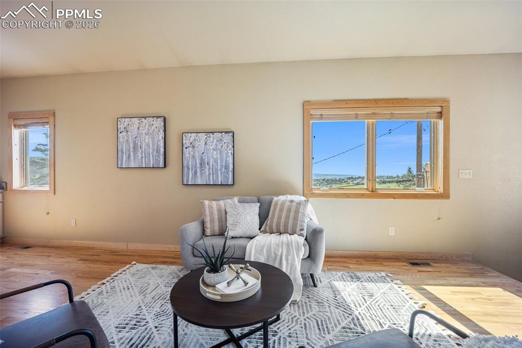 Living area featuring light wood-style flooring