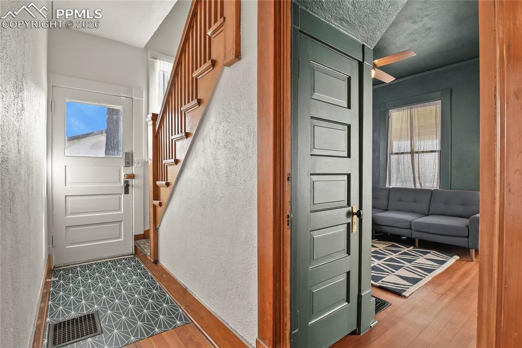 Easy conversion back to a two-unit configuration by adding a wall at the staircase with separate side entrance.