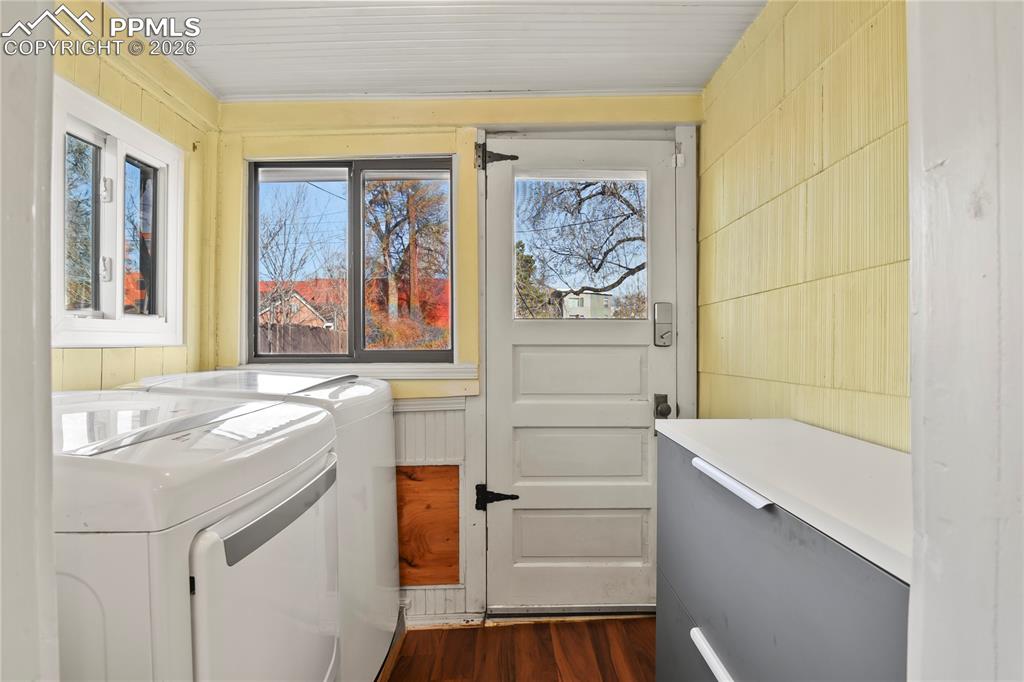 Laundry room with walk-out to backyard
