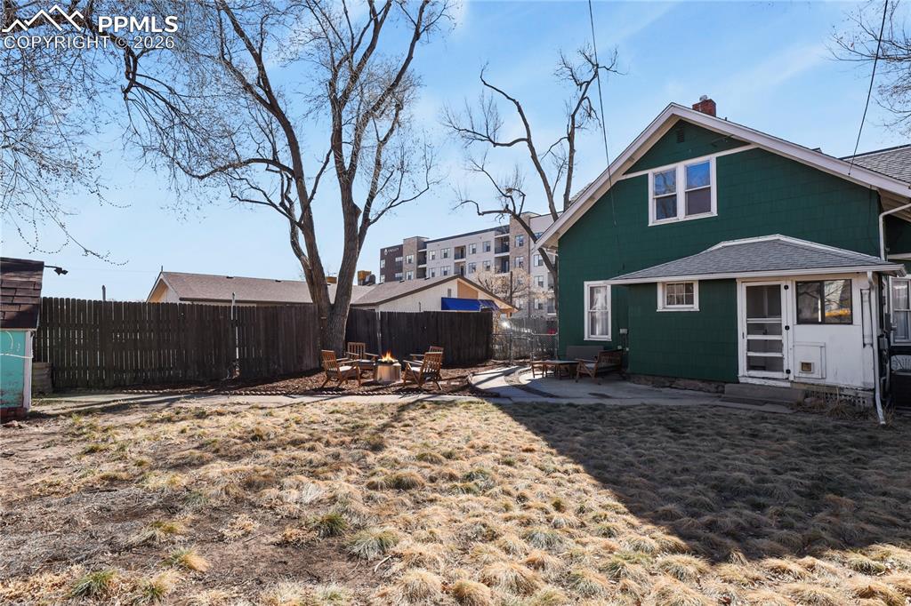 Spacious backyard with drought-resistant grass