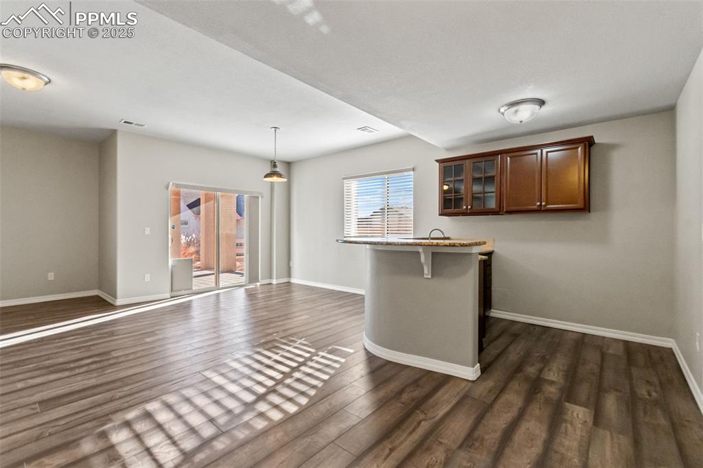 Lower level wet bar perfect for entertaining.