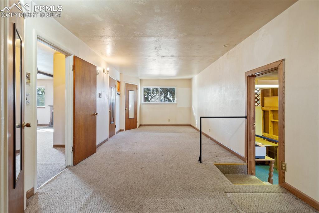 Former master bedroom w/ adjoining 3/4 bath - access on the right to office area