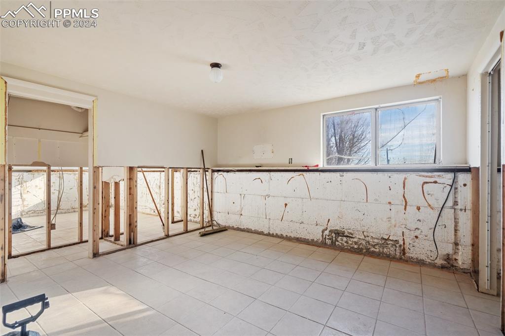 Unfinished basement bedroom 